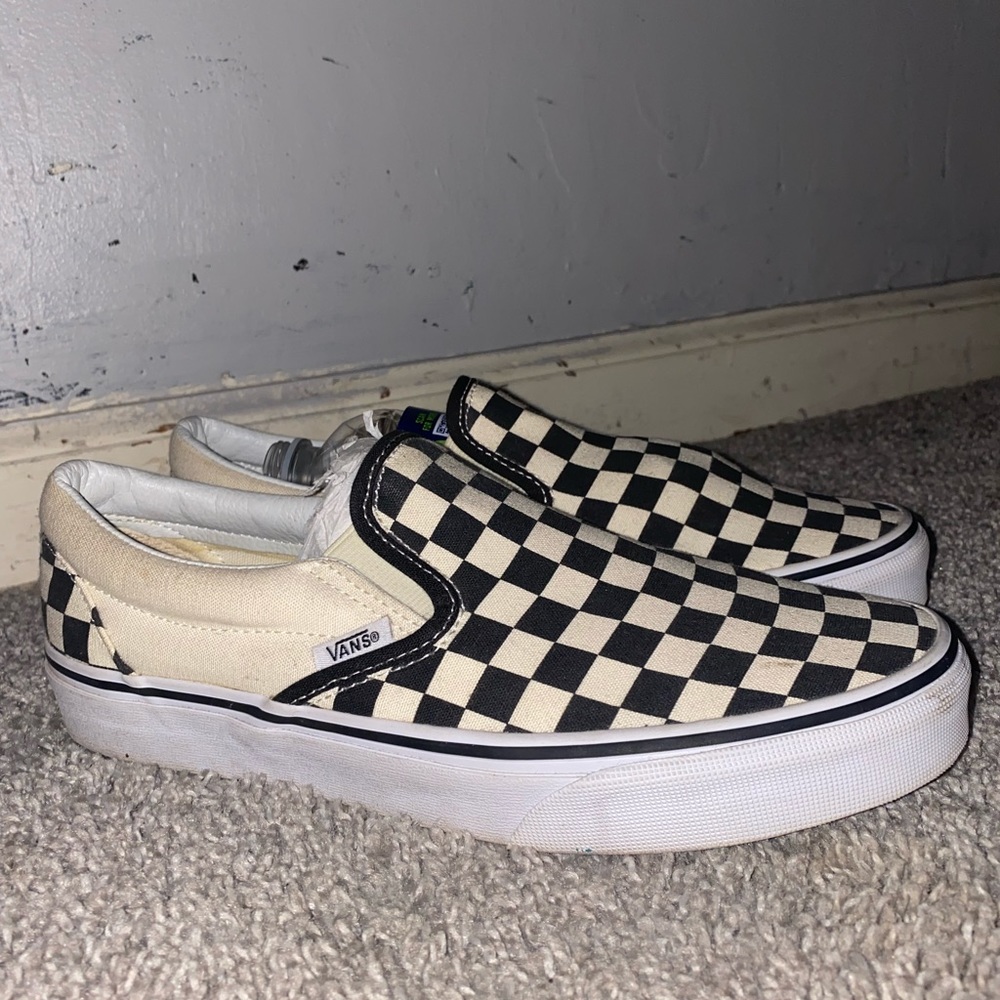 Checkered vans.